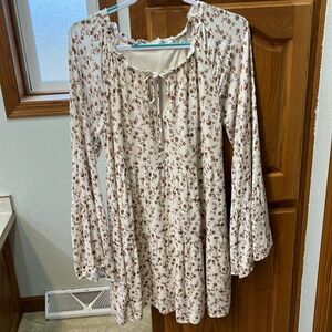 Cream and brown floral knee length dress.